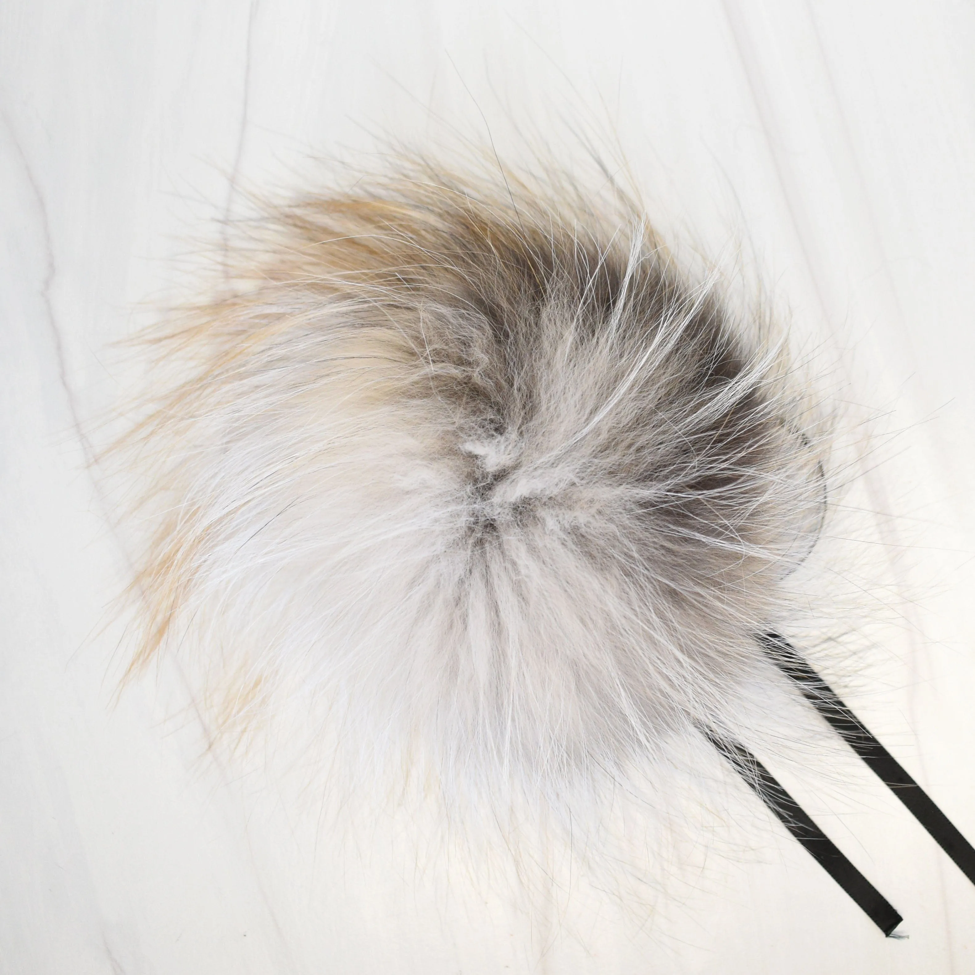 Fur Pompoms by Schildkraut