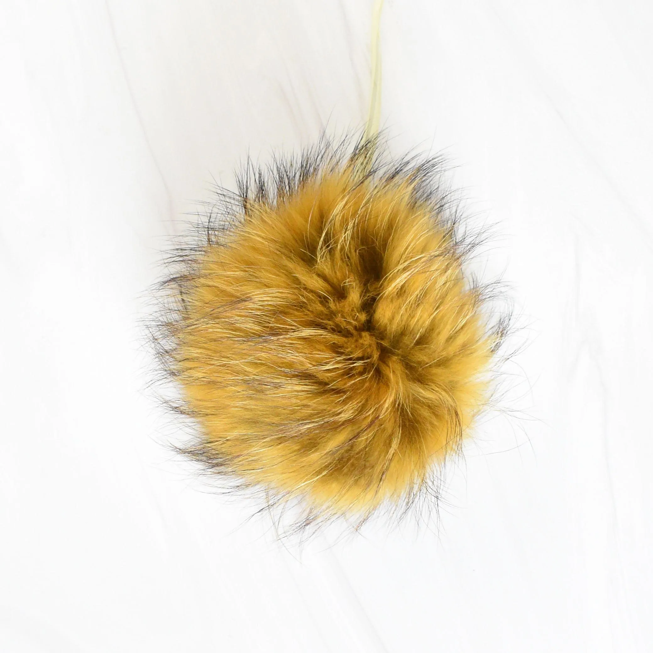 Fur Pompoms by Schildkraut