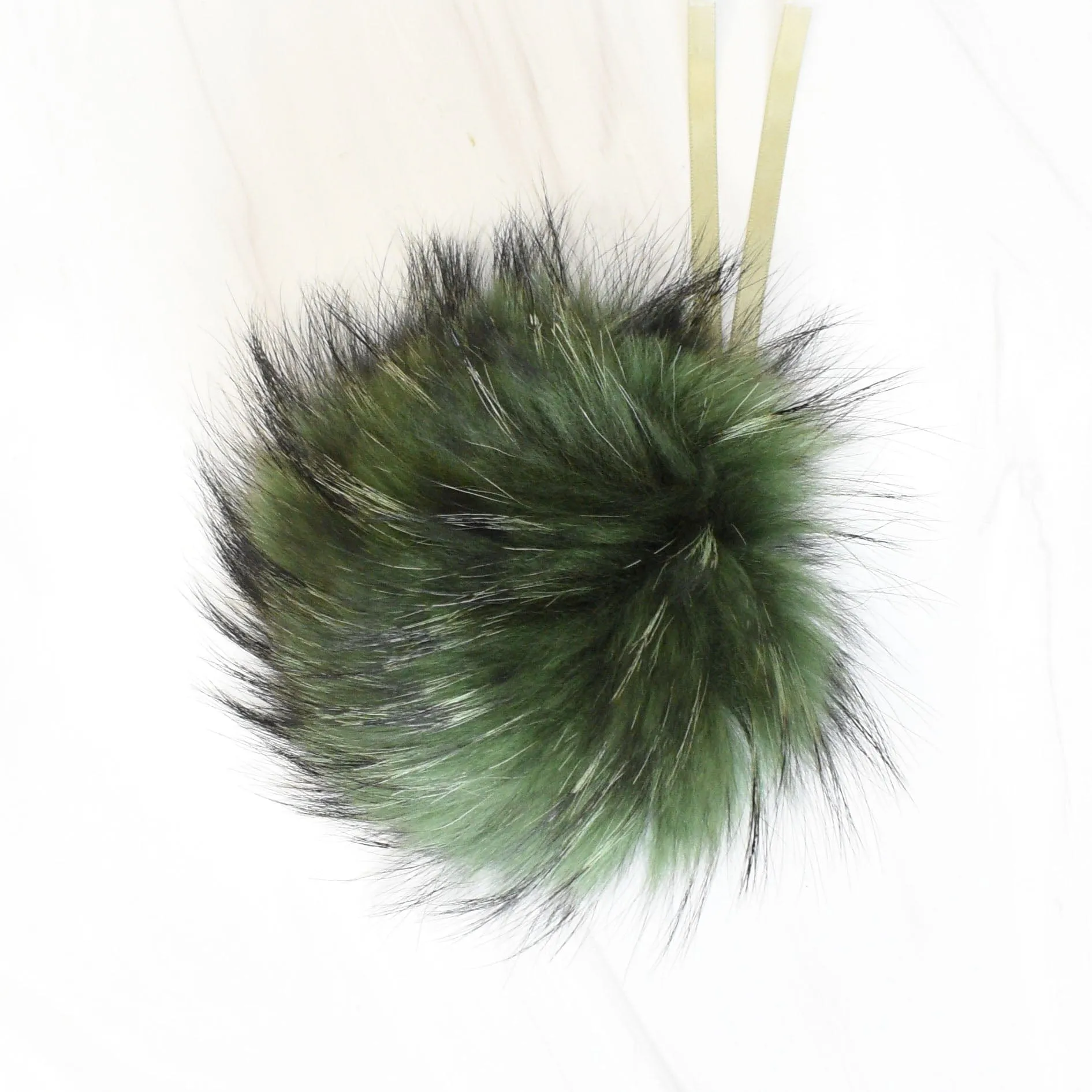 Fur Pompoms by Schildkraut