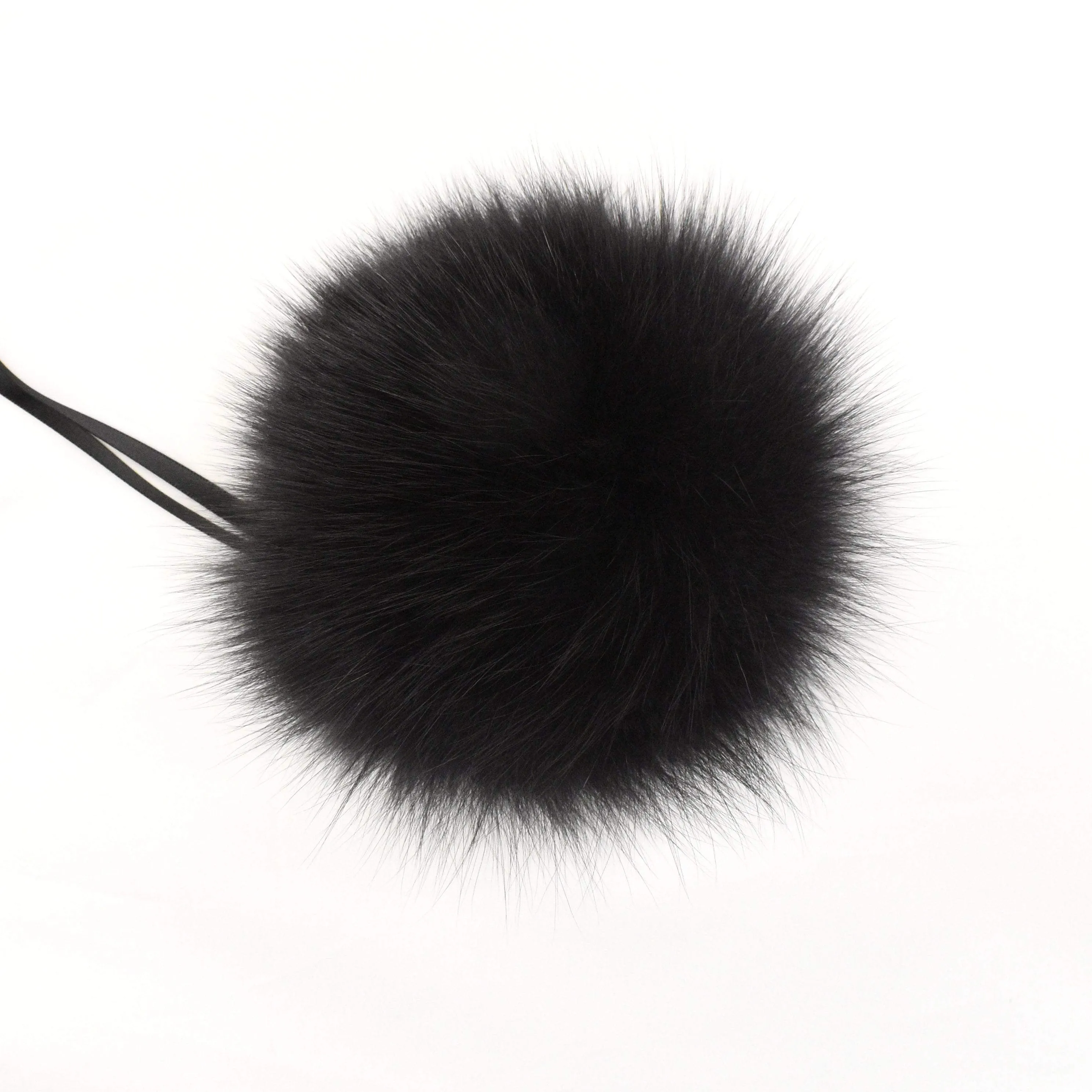 Fur Pompoms by Schildkraut